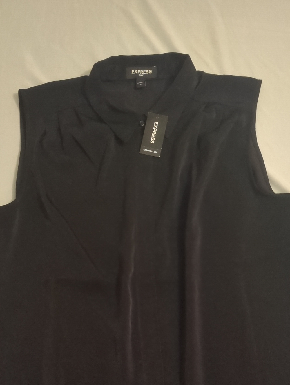 Sleeveless black Express women's tunic top